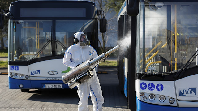 File photo: A worker wearing protective gear disinfects a public bus during the outbreak of the coronavirus disease (COVID-19) in Gdynia, Poland, April 5, 2020