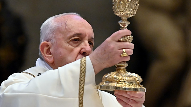 Pope Francis celebrates Easter Sunday Mass behind closed doors due to an outbreak of the coronavirus disease (COVID-19) at St. Peter's Basilica in the Vatican, April 12, 2020. Andreas Solaro/Pool via REUTERS

