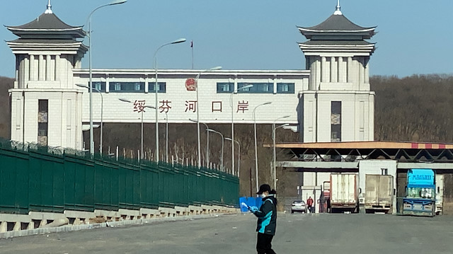 A staff member wearing a face mask is seen at the Suifenhe Port in Heilongjiang province on the border with Russia, as the spread of the novel coronavirus disease (COVID-19) continues in the country, China April 12, 2020