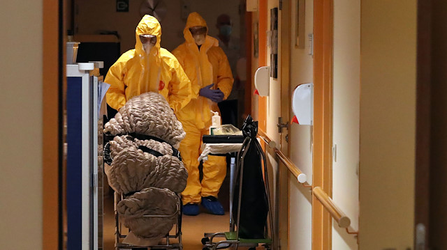File photo: Mortuary employees transport the body of a person in an elderly residence following the coronavirus disease (COVID-19) outbreak in Brussels, Belgium April 14, 2020