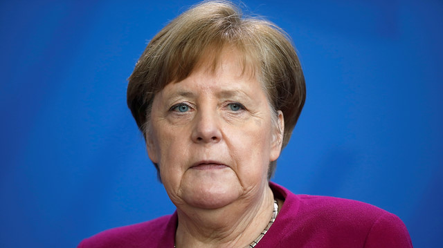 FILE PHOTO: German Chancellor Angela Merkel attends a media briefing about measures of the German government to avoid further spread of the coronavirus disease (COVID-19) at the chancellery in Berlin, Germany, April 9, 2020. Markus Schreiber/Pool via REUTERS/File Photo


