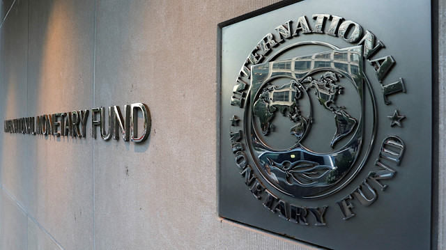 FILE PHOTO: International Monetary Fund (IMF) logo is seen outside the headquarters building in Washington, U.S., as IMF Managing Director Christine Lagarde meets with Argentine Treasury Minister Nicolas Dujovne September 4, 2018