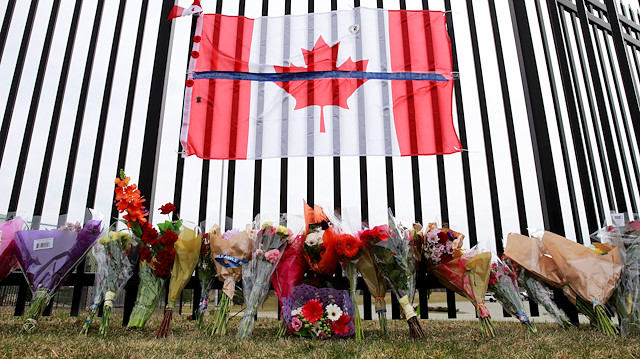 A memorial for Const. Heidi Stevenson is seen outside the Royal Canadian Mounted Police (RCMP) Headquarters, in Dartmouth, Nova Scotia, Canada April 20, 2020
