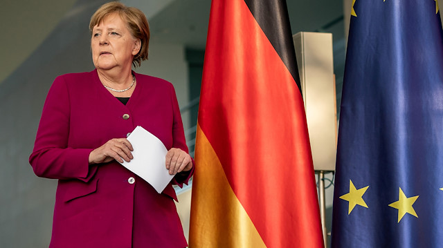German Chancellor Angela Merkel arrives for a media statement after a video conference of EU leaders on the spread of the new coronavirus disease (COVID-19) in Berlin, Germany, April 23, 2020. Michel Kappeler/Pool via REUTERS


