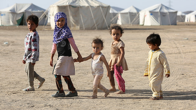 File photo: Children walk at a camp for people recently displaced by fighting in Yemen's northern province of al-Jawf between government forces and Houthis, in Marib, Yemen March 8, 2020. Picture taken March 8, 2020