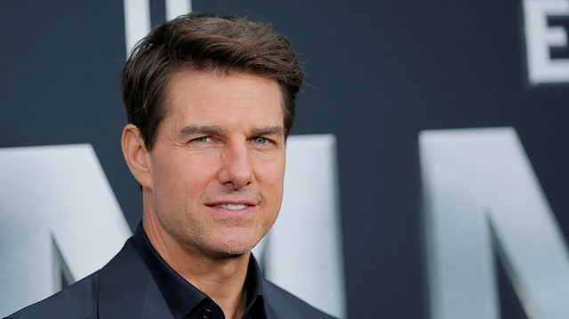 File photo: Actor Tom Cruise poses for photographers