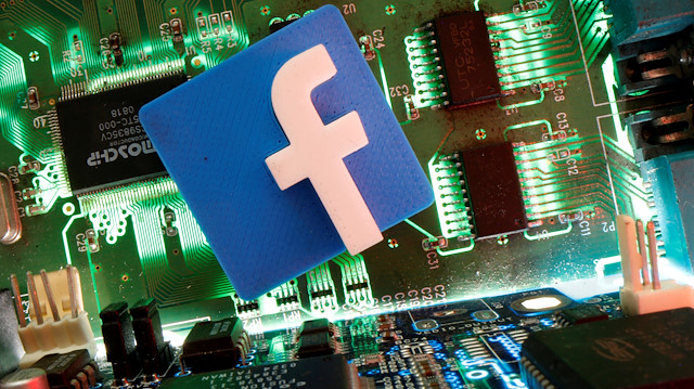 FILE PHOTO: Facebook symbol is seen on a motherboard in this picture illustration taken April 24, 2020. REUTERS/Dado Ruvic /Illustration/File Photo

