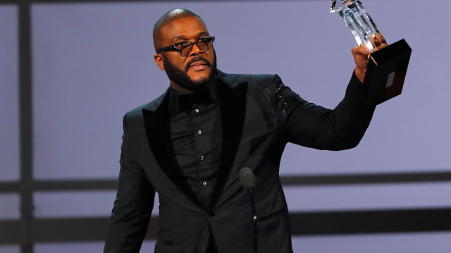 FILE PHOTO: Movie mogul Tyler Perry accepts the Ultimate Icon award at the 2019 BET Awards in Los Angeles, California, U.S., June 23, 2019 - REUTERS/Mike Blake/File Photo

