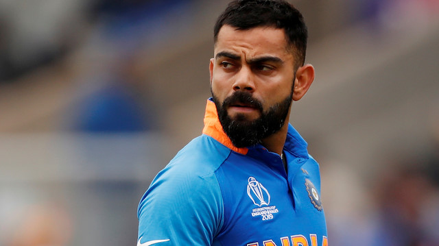 FILE PHOTO: Cricket - ICC Cricket World Cup Semi Final - India v New Zealand - Old Trafford, Manchester, Britain - July 10, 2019 India's Virat Kohli reacts after losing his wicket Action Images via Reuters/Lee Smith/File Photo