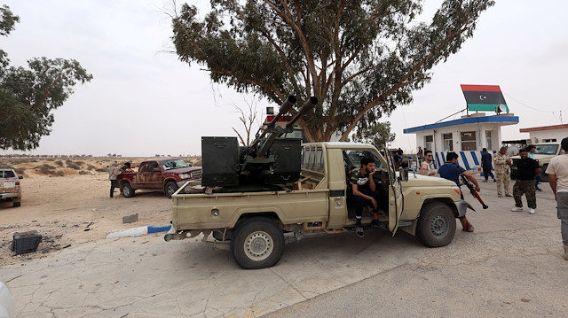 Fighters loyal to Libya's internationally recognised government are seen