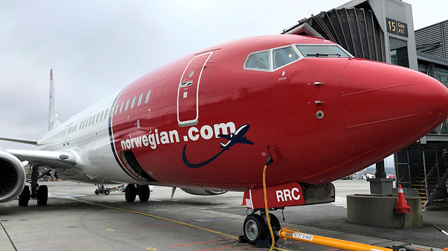 A Norwegian Air plane is refuelled at Oslo Gardermoen airport, Norway November 7, 2019.