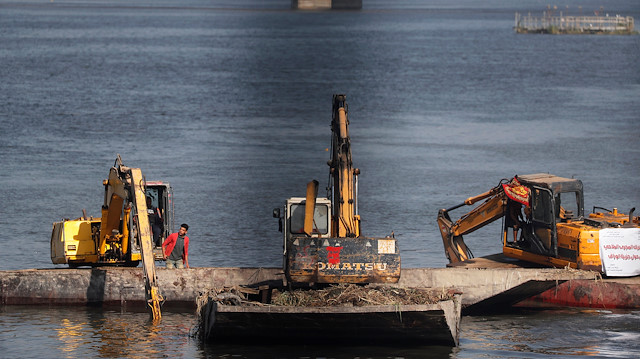 File photo: Excavators dredge the River Nile as part of a clean up operation in Cairo as Egypt, Ethiopia and Sudan meet for talks over disputed Nile dam, Egypt, December 3, 2019