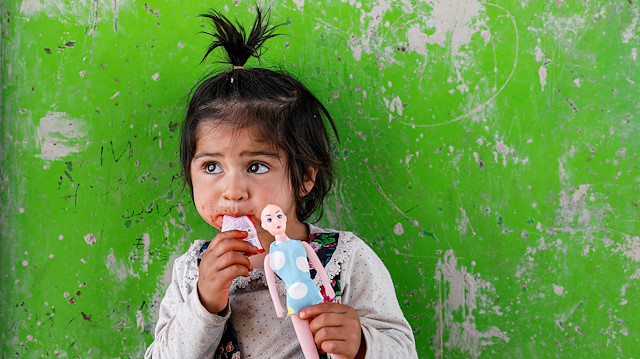 File photo: An internally displaced Afghan girl plays outside her shelter, amid the spread of the coronavirus disease (COVID-19), in Kabul, Afghanistan May 7, 2020