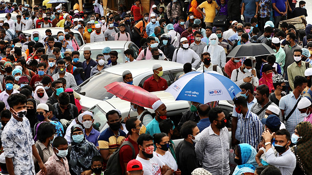 Migrant people are seen on board of an overcrowded ferry, as they go home to celebrate Eid al-Fitr, amid concerns over the coronavirus disease (COVID-19) outbreak, in Munshiganj, Bangladesh, May 23, 2020