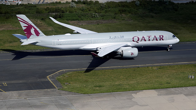 A Qatar Airways Airbus A350 lands at Paris Charles de Gaulle airport