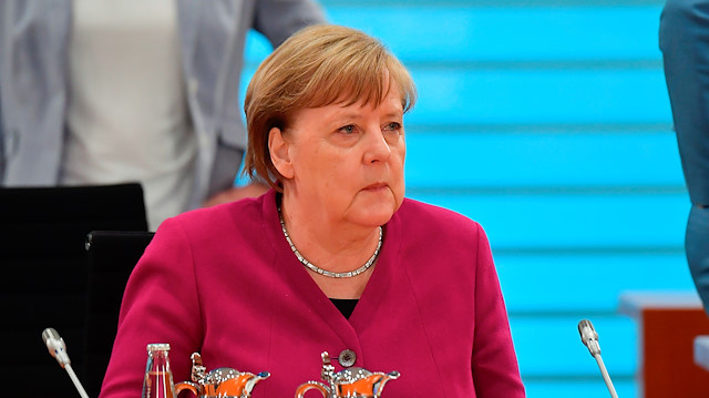German Chancellor Angela Merkel looks on at the start of the weekly cabinet meeting on May 27, 2020 at the Chancellery in Berlin, Germany. Due to the required distance to prevent from the coronavirus infection, the meeting takes place in the International Conference Room and not in the usual cabinet room. Tobias Schwarz/Pool via REUTERS

