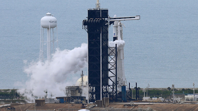 A SpaceX Falcon 9 rocket purges fuel after topping off before scheduled launch of NASA's SpaceX Demo-2 mission to the International Space Station from NASA's Kennedy Space Center in Cape Canaveral, Florida, U.S. May 27, 2020