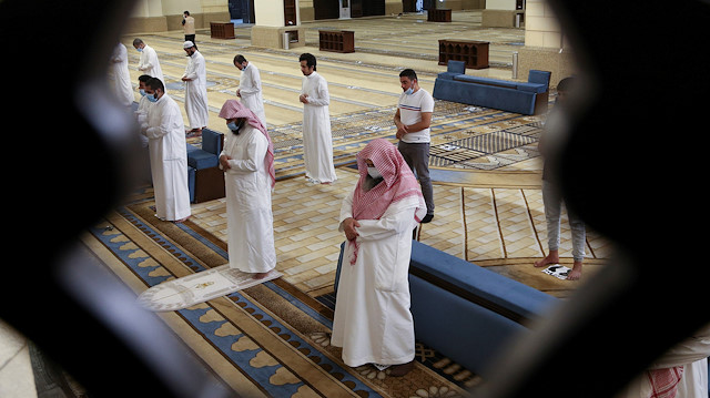 Muslims perform the Al-Fajr prayer inside the Al-Rajhi Mosque