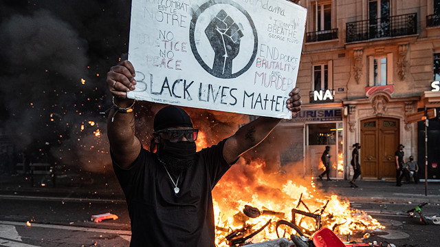 Clashes mar Paris protest over black man's death