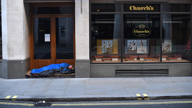 A homeless man sleeps in central London, as the spread of the coronavirus disease 