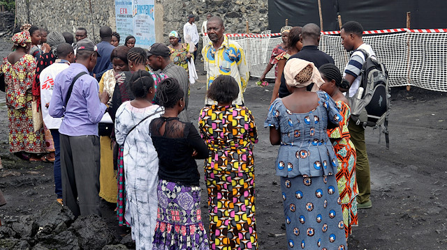 Congolese residents gather around Medecins Sans Frontieres (MSF) health workers as they prepare the introduction of the second ebola vaccine produced by Johnson & Johnson, in Majengo neighborhood of Goma, Democratic Republic of Congo, November 14, 2019.