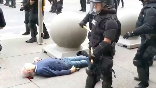SENSITIVE MATERIAL. THIS IMAGE MAY OFFEND OR DISTURB An elderly man bleeds from his ears after falling, after appearing to be shoved by riot police during a protest against the death in Minneapolis police custody of George Floyd, in Buffalo, New York, U.S. June 4, 2020 in this still image taken from video. WBFO/via REUTERS 