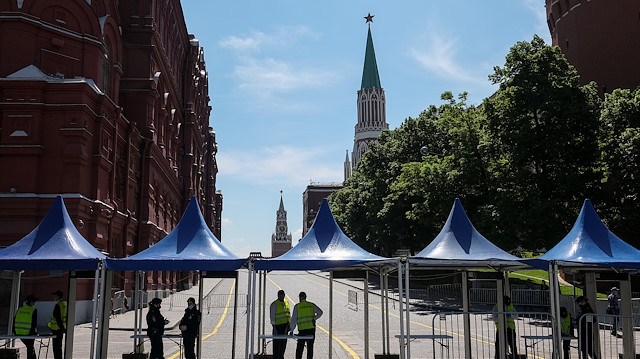 Security personnel get ready ahead of the annual Red Square Book Fair