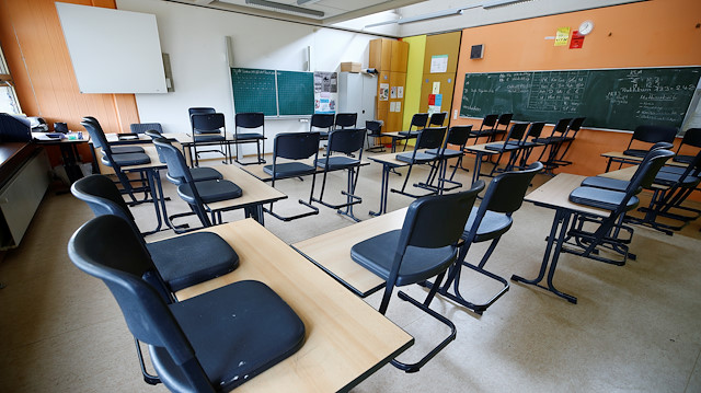 Chairs are placed on tables in an empty classroom of the Freiherr-vom-Stein secondary school in Bonn, amid authorities' discussions whether schools should be closed nationwide due to the coronavirus disease (COVID-19), in Bonn, Germany March 13, 2020. 