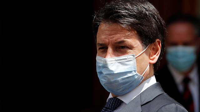 Italian Prime Minister Giuseppe Conte wearing a protective face mask, leaves the Senate as the spread of the coronavirus disease (COVID-19) continues, in Rome, Italy May 20, 2020