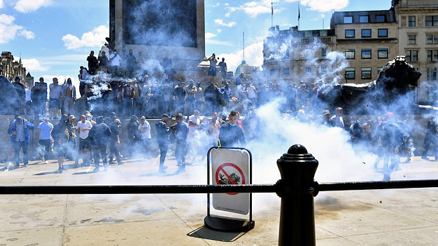 Counter-protesters stand under Nelson's Column in Trafalgar Square ahead of a Black Lives Matter protest following the death of George Floyd in Minneapolis police custody, in London, Britain, June 13, 2020 