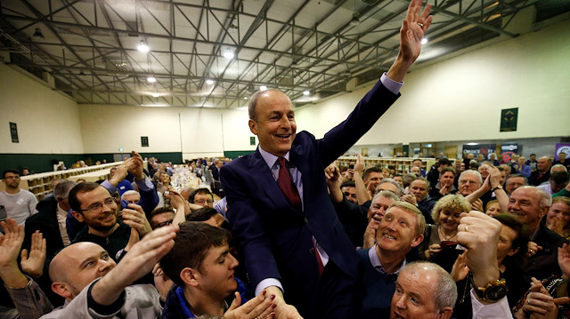 Fianna Fail leader Micheal Martin celebrates after the announcement of voting results, at a count centre during Ireland's national election, in Cork, Ireland, February 9, 2020. 