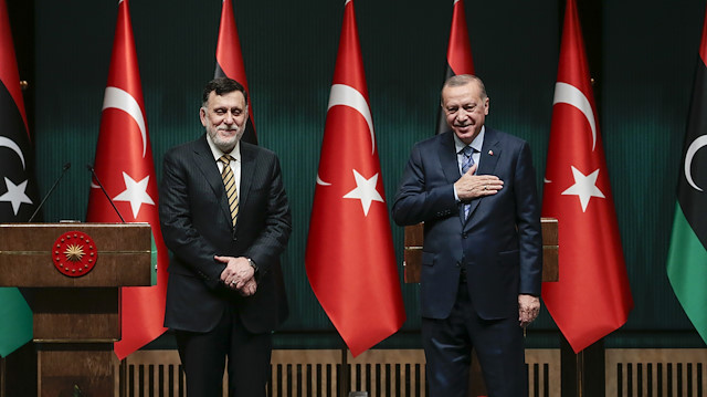 Cumhurbaşkanı Erdoğan (sağda) ve Libya Başbakanı Serrac (solda). 