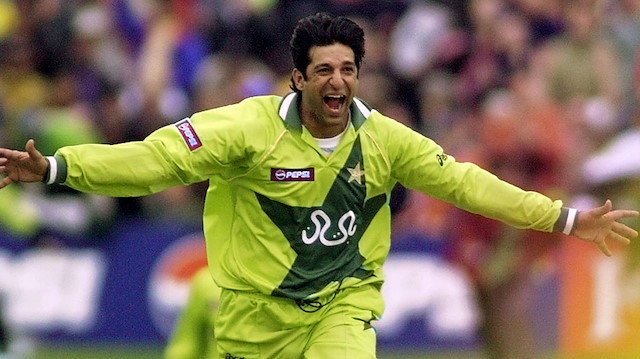 FILE PHOTO: ON THIS DAY -- May 23 May 23, 1999 CRICKET - Pakistan captain Wasim Akram celebrates after his side beat Australia in the group stage of the World Cup to put one foot in the Super Six stage. Akram picked up four wickets to ensure Pakistan won the match by 10 runs and they eventually topped the group to qualify along with Australia and New Zealand. Pakistan would reach the final that year to face the same opposition but were beaten by Australia, who won the match by eight wickets to lift the first of their three consecutive World Cup titles. REUTERS/Ian Hodgson/File photo

