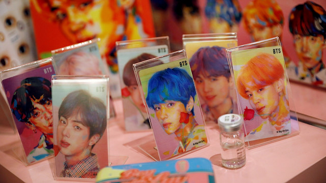 FILE PHOTO: Goods of K-pop idol boy band BTS are seen on display at a pop-up store selling BTS merchandise in Seoul, South Korea, December 24, 2019. REUTERS/Kim Hong-Ji/File Photo

