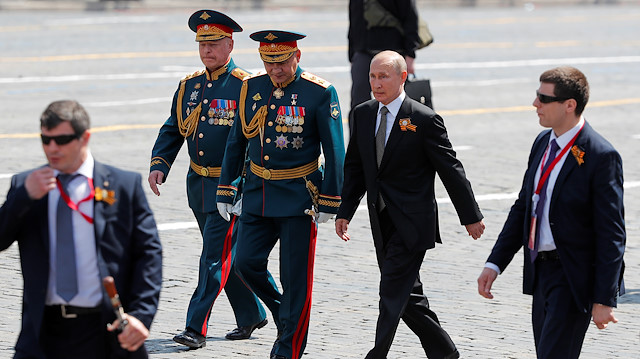 Russia's President Vladimir Putin, Defence Minister Sergei Shoigu 
