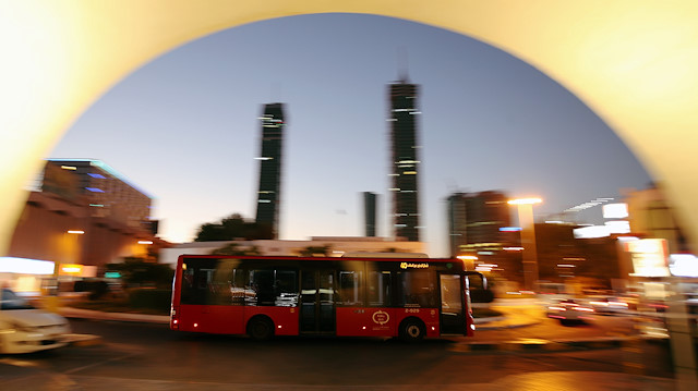 A bus passes the Bab Al-Bahrain (Door of Bahrain) tourist point, following the outbreak of the coronavirus disease (COVID-19), in Manama, Bahrain June 20, 2020. REUTERS/Hamad I Mohammed

