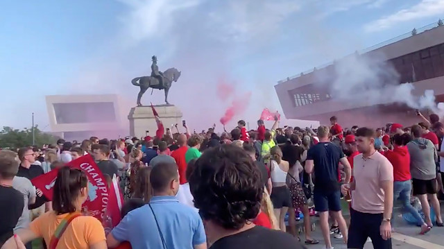 Soccer fans gather at Liverpool's Pier Head, during the novel coronavirus pandemic, celebrating Liverpool FC winning the Premier League title, in Britain June 26, 2020 in this still image taken from social media video. Content filmed June 26, 2020
