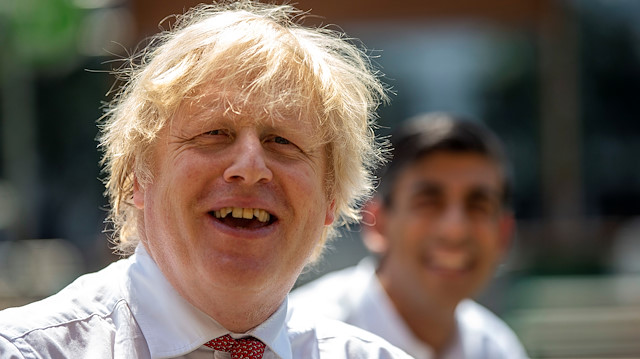 Britain's Prime Minister Boris Johnson and Chancellor Rishi Sunak visit Pizza Pilgrims in West India Quay, in London, Britian June 26, 2020. Heathcliff O'Malley/Pool via REUTERS

