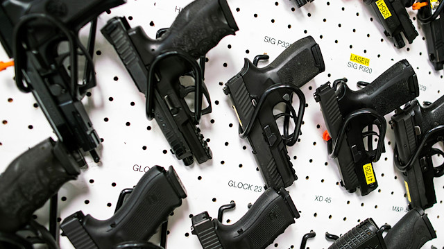 Guns are displayed at Shore Shot Pistol Range gun shop