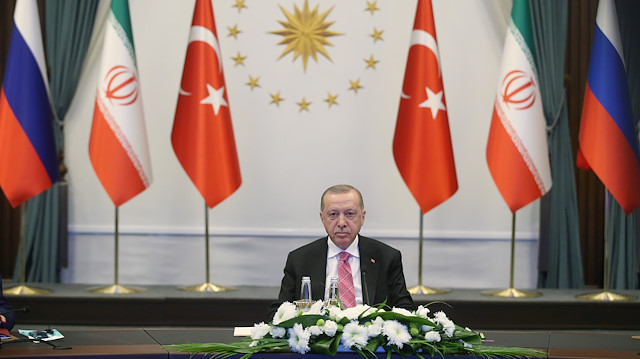 Turkish President Tayyip Erdoğan attends a video conference call, dedicated to the conflict in Syria, with Russia's President Vladimir Putin and Iran's President Hassan Rouhani in Ankara, Turkey, July 1, 2020.