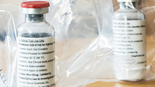 FILE PHOTO: Two ampules of Ebola drug Remdesivir are pictured during a news conference at the University Hospital Eppendorf (UKE) in Hamburg, Germany, April 8, 2020, as the spread of coronavirus disease (COVID-19) continues. Ulrich Perrey/Pool via REUTERS/File Photo