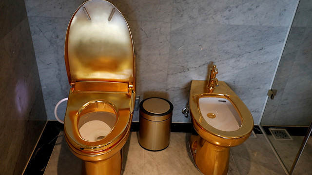 FILE PHOTO: Gold-plated toilets are seen at the newly inaugurated Dolce Hanoi Golden Lake hotel, after the government eased a nationwide lockdown following the global outbreak of the coronavirus disease (COVID-19), in Hanoi, Vietnam July 2, 2020. REUTERS/Kham/File Photo

