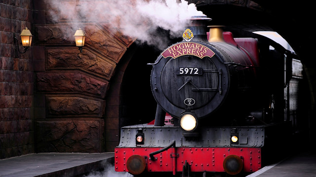 FILE PHOTO: The Hogwarts Express train, which connects the Universal Studios with neighboring Islands of Adventure, pulls into the Hogsmeade Station at the Universal Orlando Resort in Orlando, Florida June 19, 2014.REUTERS/David Manning/File Photo

