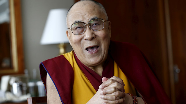FILE PHOTO: Tibetan spiritual leader the Dalai Lama talks with journalists in Geneva, Switzerland March 11, 2016. REUTERS/Denis Balibouse/File Photo

