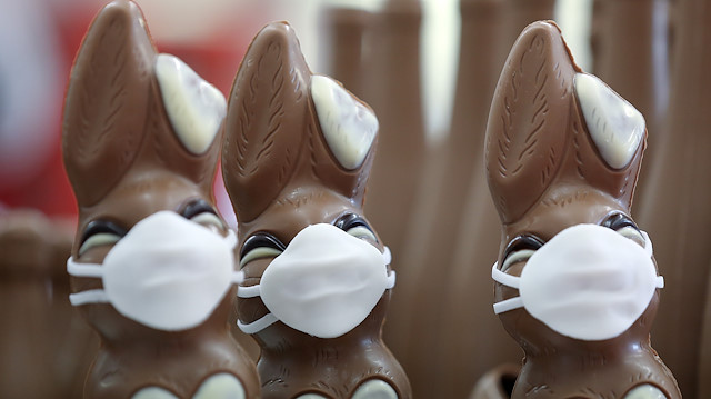  Chocolate Easter Bunnies with a protective mask and a roll of toilet paper