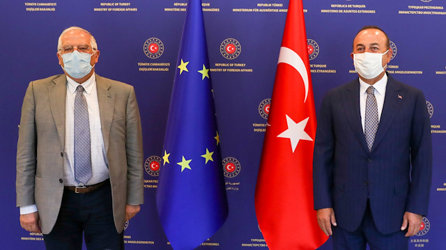 Turkish Foreign Minister Mevlut Cavusoglu and Josep Borrell Fontelles, High Representative of the European Union for Foreign Affairs and Security Policy, wear protective face masks as they pose before their meeting in Ankara, Turkey, July 6, 2020
