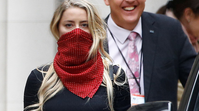 Actor Amber Heard leaves the High Court in London, Britain, July 7, 2020. REUTERS/Henry Nicholls

