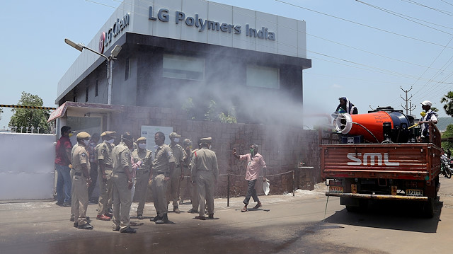 FILE PHOTO: Municipal workers decontaminate outside of the LG Polymers Plant following a gas leak at the plant in Visakhapatnam, India, May 8, 2020. 