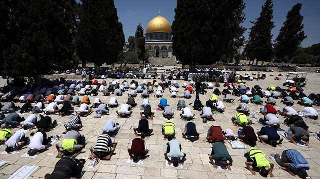 File photo: Muslim men keep social distancing to fight the spread of the coronavirus disease (COVID-19) during Friday prayer next to al-Aqsa mosque on the compound known to Muslims as the Noble Sanctuary and to Jews as the Temple Mount, in Jerusalem's Old City July 10, 2020