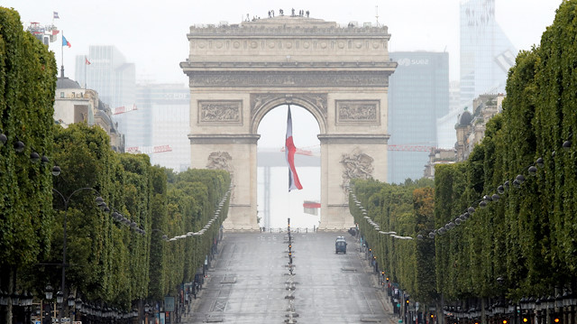 The empty Champs Elysees avenue and the Arc de Triomphe are pictured after the Bastille Day military parade, honouring French health workers and their dedication in the fight against the coronavirus disease (COVID-19), in Paris, France July 14, 2020.